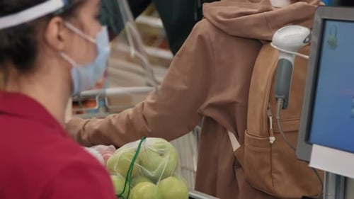 Young Couple At Checkout