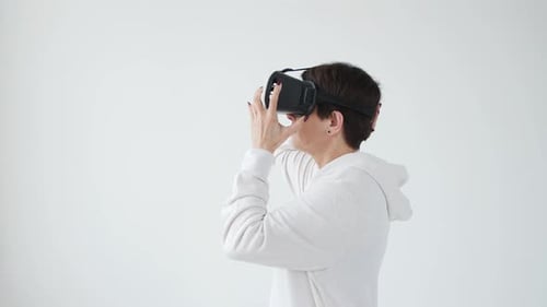 Adult Using Virtual Reality Headset Indoors