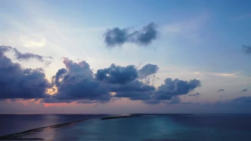 Aerial top view tourism of paradise resort beach trip by blue ocean with white sand background of a