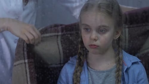 Nurse Covering Little Sad Girl With Warm Plaid, Child Missing Home in Hospital
