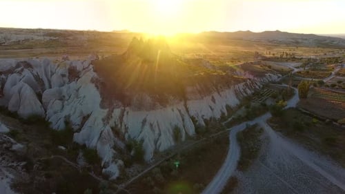 White Hoodoos, Fairy Chimneys and Sedimentary Volcanic Rock Formations in Sunrise Morning
