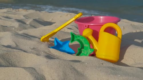 Children's toys on the beach.