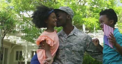 Military Father Returns Home to Smiling Children