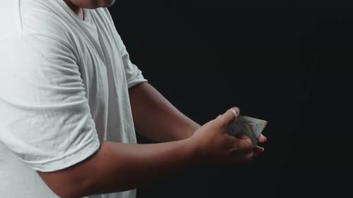 Hands Shuffling Deck of Cards