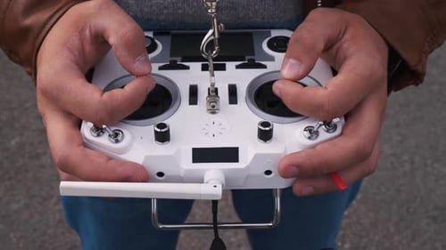 FPV Drone Racer Holding Remote Control Close Up