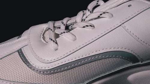 Rotating White Sneaker in Macro Detail