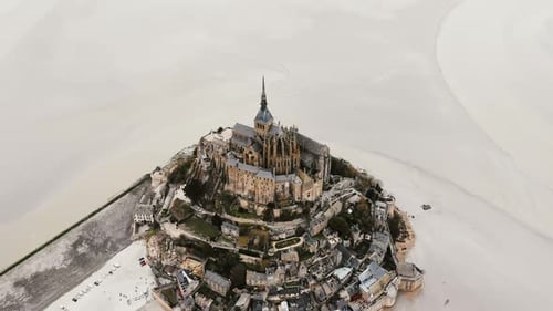 Drone Slowly Descending Above Mont Saint Michel Island Fortress, Famous French Historic Landmark