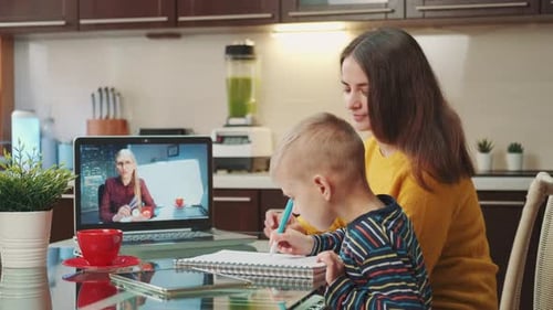 Mother and Child Video Calling with Tutor