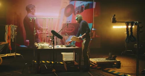 Sound Designer Recording Soundtrack for Painting Video