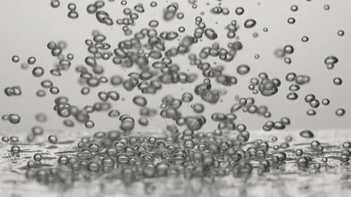 Rising Bubbles in Clear Liquid, Close Up