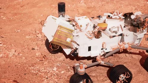 Mars Rover Exploring Red Rocky Terrain on Distant Planet