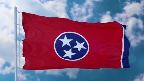 Realistic Waving Tennessee State Flag in Blue Sky