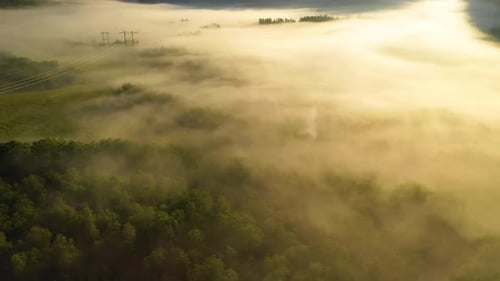 Morning Mist Over the Valley Among the Mountains in the Sunlight