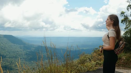 Inspired Travel Woman with Backpack Standing on Top Mountain View Point