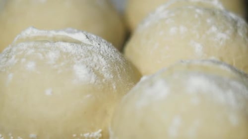 Raw Dough Balls Prepared for Baking