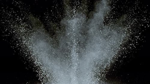 White Powder Explosion on Black Background