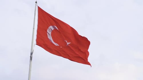 Turkish Flag Waving in Wind, Cloudy Sky
