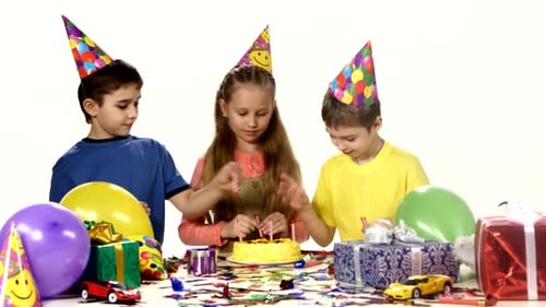 Children Celebrating Birthday with Cake and Gifts