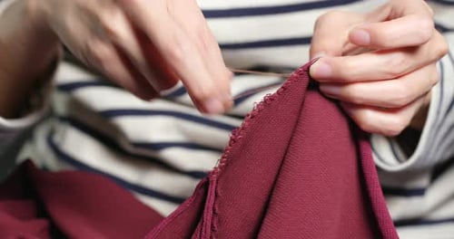 Close Up of Hands Doing Needlework