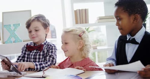 Kids as business executives working together 4k
