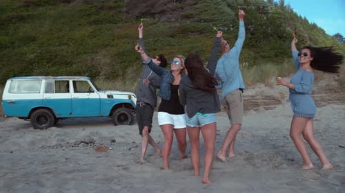 Super slow motion shot of group of friends blowing bubbles at beach, shot with Phantom Flex 4K