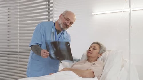 Doctor Coming to Show X-ray Pic to Patient