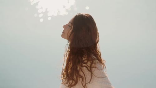 Woman Resting on the Beach During Vacation