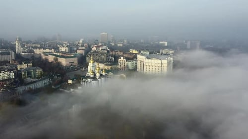 Aerial View of the City in the Fog