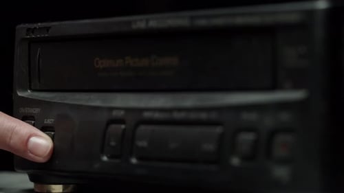 Taking Video Cassette Into Recorder