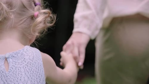 Motherhood. Child Holding Mother Hand Closeup