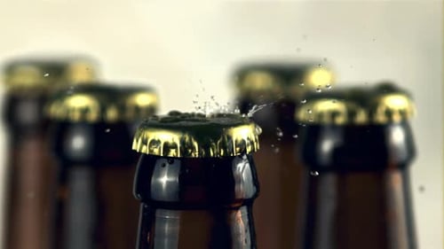 Condensation Dripping on a Brown Glass Bottle Cap