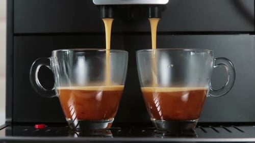 Espresso Machine Dispenses Two Cups of Fresh Coffee