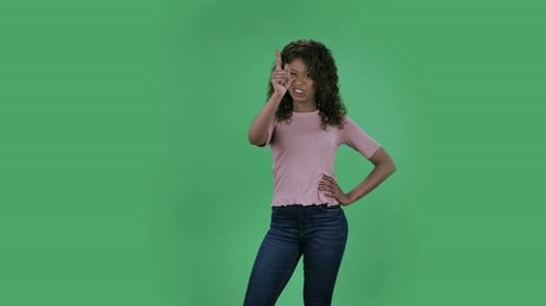 Woman Gesturing with Hand on Green Screen