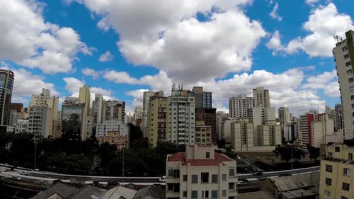 Cityscape View With Clouds Passing Overhead