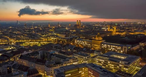 Stunning Munich Cityscape at Night with Glowing City Streets and Office Building, Magical Day To