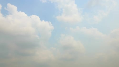 Time lapse of white cloud moving pass around sky background
