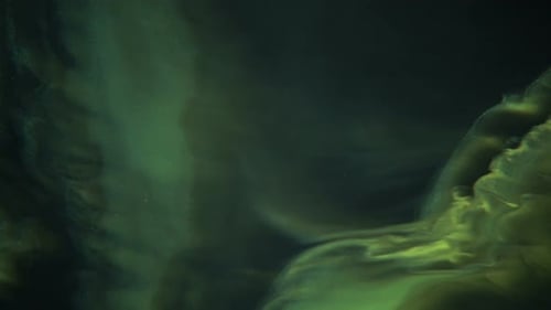 A Mix of Black,Green and Yellow Paint