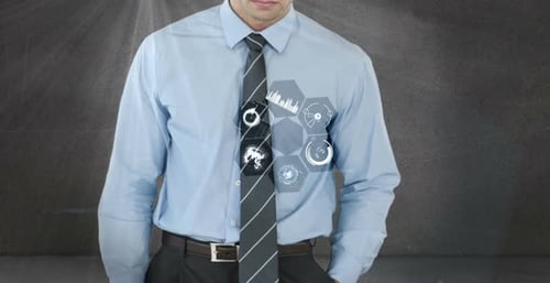 Businessman using digital interface screen with icons