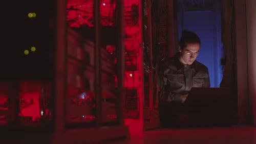 Coder Working in Dark Datacenter