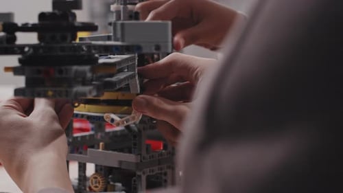 Unrecognizable Kids Building Construction