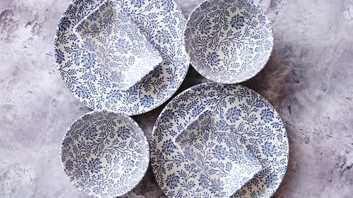 Elegant Blue Floral Pattern Dinnerware Still Life