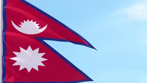 Realistic Nepal Flag Waving Loop Against Blue Sky