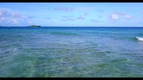 Aerial top down seascape of tropical coastline beach holiday by blue ocean with white sand backgroun