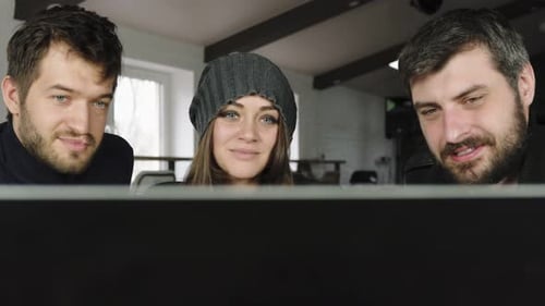 Team of Young Professionals Having a Conference Call in a Creative Office