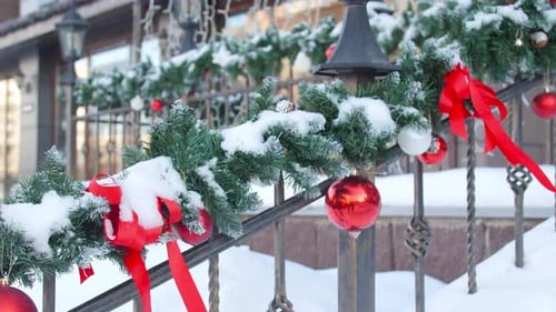 Christmas Decor on the Railing. Entrance To a House or Cafe