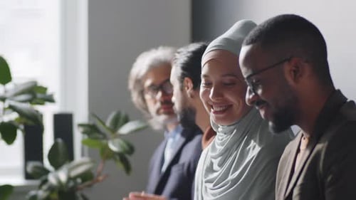 Diverse Job Candidates Waiting in Office