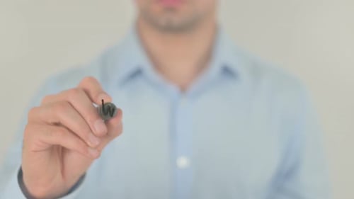 Man Writes the Word Worldwide on Glass