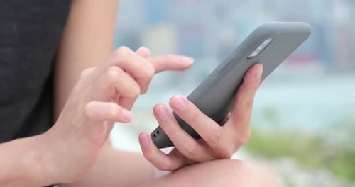 Close up woman use of smart phone at outdoor