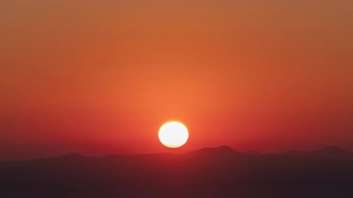 Majestic Sunrise over Mountain Range Time-Lapse