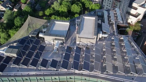 Ecology solar power station panels in the skyscraper energy at sunset landscape electrical innovatio
